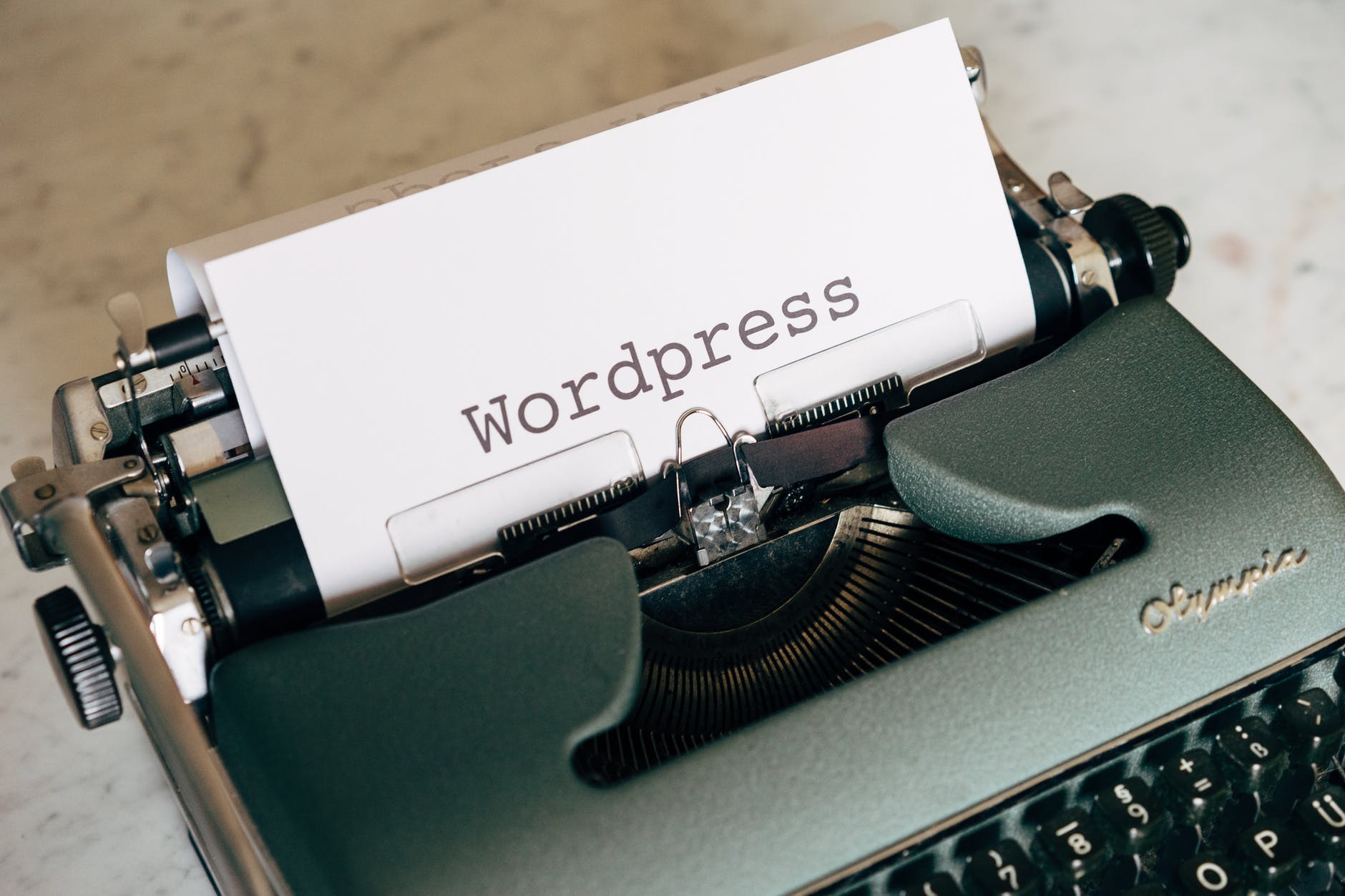close up shot of a typewriter for your WordPress site